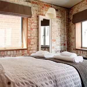 A comfortable room with gorgeous light and flatscreen TV