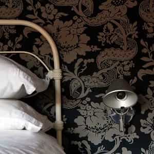 Floral wallpaper adds a luxurious touch